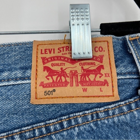Levi's 501 medium wash button placket frayed raw edge whiskered denim shorts. - Picture 7 of 13